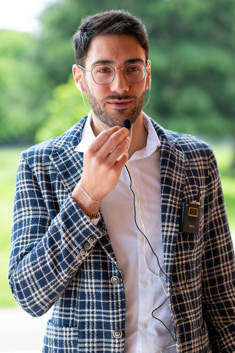 Giacomo Collini, conference interpreter, translating simultaneously using the tour guide system